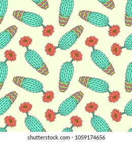 Seamless pattern with colorful hand drawn cactuses.Vector illustration.