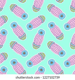 Seamless pattern with colorful hand drawn cactuses on mint background.Vector illustration.