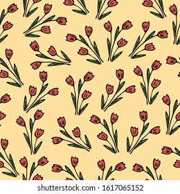 Seamless pattern with colorful hand drawn Tulip flowers on a yellow background. It can be used for decoration of textile, paper and other surfaces.