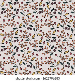 Seamless pattern with colorful hand drawn berries on a beige background. It can be used for decoration of textile, paper and other surfaces. 