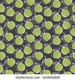Seamless pattern with colorful hand drawn green apples on a dark background. It can be used for decoration of textile, paper and other surfaces.