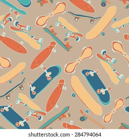 Seamless pattern with colorful hand drawn skateboards on beige background. Vector illustration