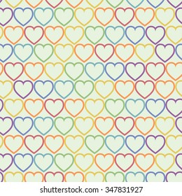 Seamless pattern with colorful hearts.
