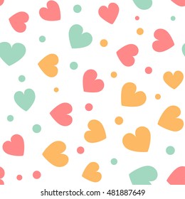 Seamless pattern with colorful hearts and dots on a white background. Vector repeating texture.