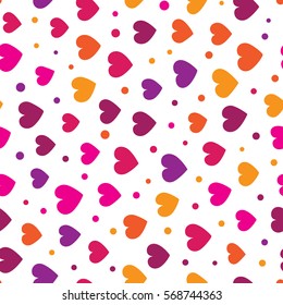 Seamless pattern with colorful hearts and dots on a white background. Simple vector repeating texture. Perfect for printing on fabric or paper.