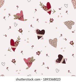 Seamless pattern with colorful hearts. Light background.
