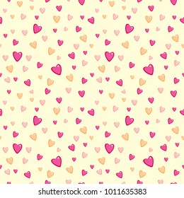Seamless pattern with colorful hearts on yellow background. Vector illustration.