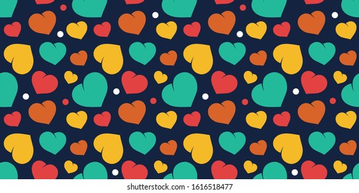 Seamless pattern with colorful hearts on a blue background. vector 