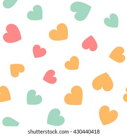 Seamless pattern with colorful hearts on a white background. Vector repeating texture.