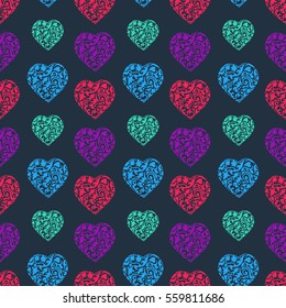 Seamless pattern of colorful hearts on the dark background.