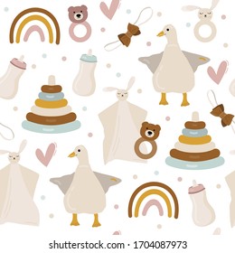 Seamless pattern of colorful kids toys, room decor in brown, blue and pink colors. Vector illustration with cartoon doodle kids elements for nursery room decor, children design, baby shower invite.