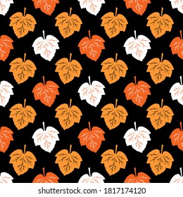 Seamless pattern of colorful leaves on a black background. Autumn leaf fall. Vector illustration great for use as a creative design. For decorating banners, cards, prints, textiles, fabric, crafts.