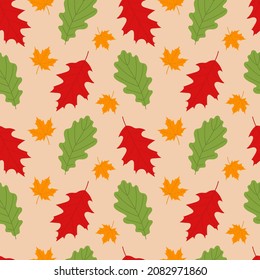 Seamless pattern with colorful leaves on beige background. Autumn pattern. Flat vector illustration.