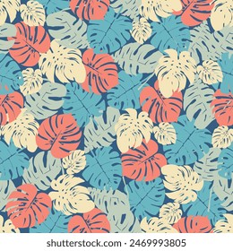 Seamless pattern of colorful leaves on dark green background. Presented through the close positioning of leaves together as one wall. This format is suitable for printing on fabric, textiles and paper