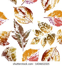 Seamless pattern of colorful leaves prints. Vector illustration on white background for printing on fabric, wrapping paper, wallpaper, textiles.