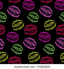 Seamless pattern with colorful lips imprints isolated on black background.