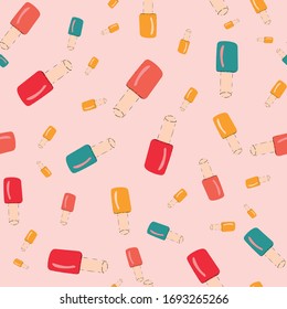 Seamless pattern with colorful nail varnish.
