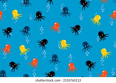 Seamless pattern with colorful octopuses isolated on blue background. Cute doodle design for kids.