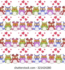 Seamless pattern of colorful owls on a white background