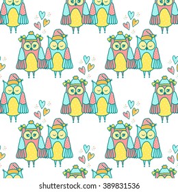 Seamless pattern of colorful owls on a white background