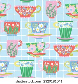 Seamless pattern with colorful painted tea cups for textile design. Kitchen decorative background in bright colors. Hand-drawn trendy vector illustration with mugs and flowers.