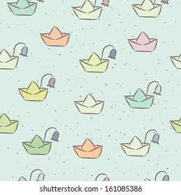 Seamless pattern with colorful paper boats on the water. Vector illustration