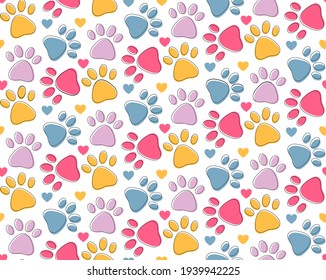 Seamless pattern with colorful pets paws. Cat or dog footprint outline cute childish bright background with hearts on white. Animal backdrop for pet shop, vet, children textile design, paper, fabric
