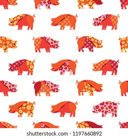 Seamless pattern with colorful pigs. Design for wallpaper, textile. Patchwork style.