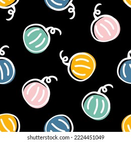 Seamless pattern with colorful pumpkins and black background