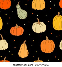 Seamless pattern with colorful pumpkins on black background. Hand drawn vector illustration. Autumn texture for print, textile, fabric, packaging.