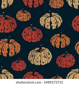 Seamless pattern with colorful pumpkins on dark blue background. Vector autumn background