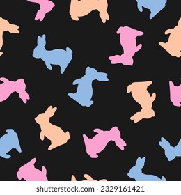 Seamless pattern with colorful rabbit and black background