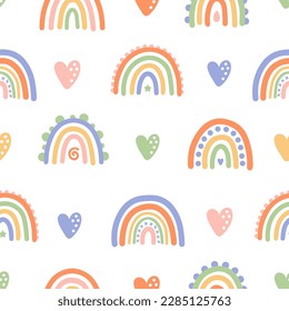 Seamless pattern with colorful rainbows and hearts