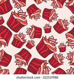 Seamless pattern of colorful red cupcakes. Food design. It can be used for website background, greeting cards or party invitations.