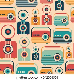 Seamless pattern with colorful retro radios and cameras.