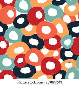 Seamless pattern of colorful, rough spots with holes.