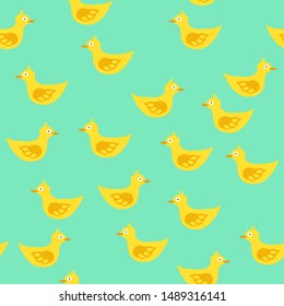 Seamless pattern with colorful rubber ducks.