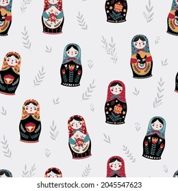 Seamless pattern with colorful Russian dolls and leaves. Matryoshka background.