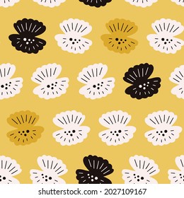 Seamless pattern with colorful shells on yellow background. Modern design for fabric and paper, surface textures.