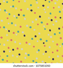 Seamless pattern with colorful small organic shapes. Memphis style vector background