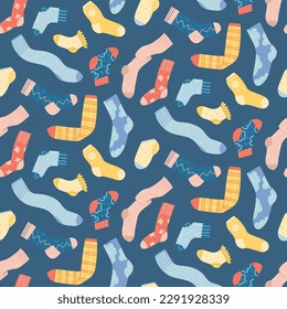 seamless pattern with colorful socks and stockings on a dusty blue background