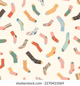 Seamless pattern with colorful socks. Warm accessories with modern patterns. Unisex clothes in neutral colors on light background. Retro muted palette. Vector illustration