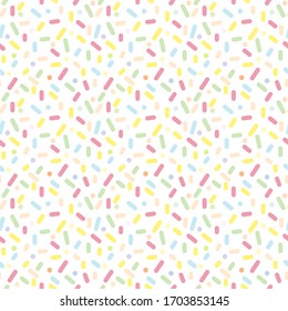 Seamless pattern with colorful sprinkles. Cupcake donuts, dessert, sugar, bakery background.