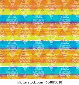 Seamless pattern with colorful stripes and ornate rhombus silhouettes