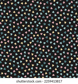 Seamless pattern with colorful tiny hearts and black background