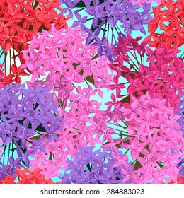 Seamless pattern with colorful tropical flowers. Vector background.