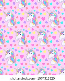 Seamless pattern with colorful unicorn and hearts on white background.