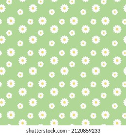 Seamless pattern in colors. White flowers on a green background.It is well suited for wrapping paper, holiday invitations, greeting cards and backgrounds.