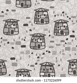 A seamless pattern composed of amusing stone towers, located on a background of random lines.