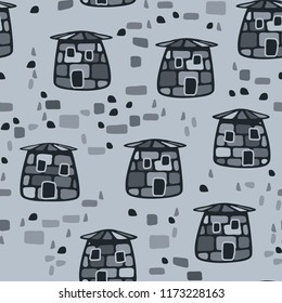 A seamless pattern composed of amusing stone towers, there is a scattering of stones between the towers.